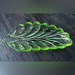 Vintage Uranium glass leaf celery dish. 9.5”L Strong UV Reactive Glow.